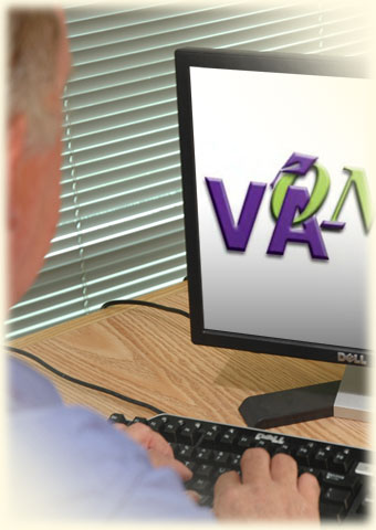 Photo of a computer displaying the VA-ONCE logo on the computer screen.